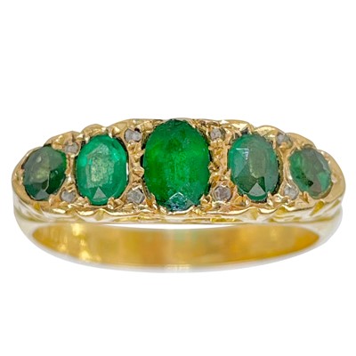 Lot 71 - An Edwardian 18ct emerald set five-stone ring.