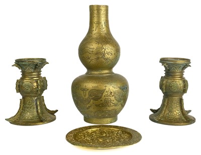 Lot 1161 - A pair of Chinese brass gu vases, circa 1900.