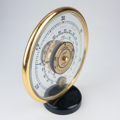 Lot 245 - A Jaeger desk top barometer.