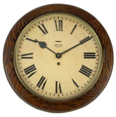 Lot 320 - A Smith's eight-day circular wall clock.