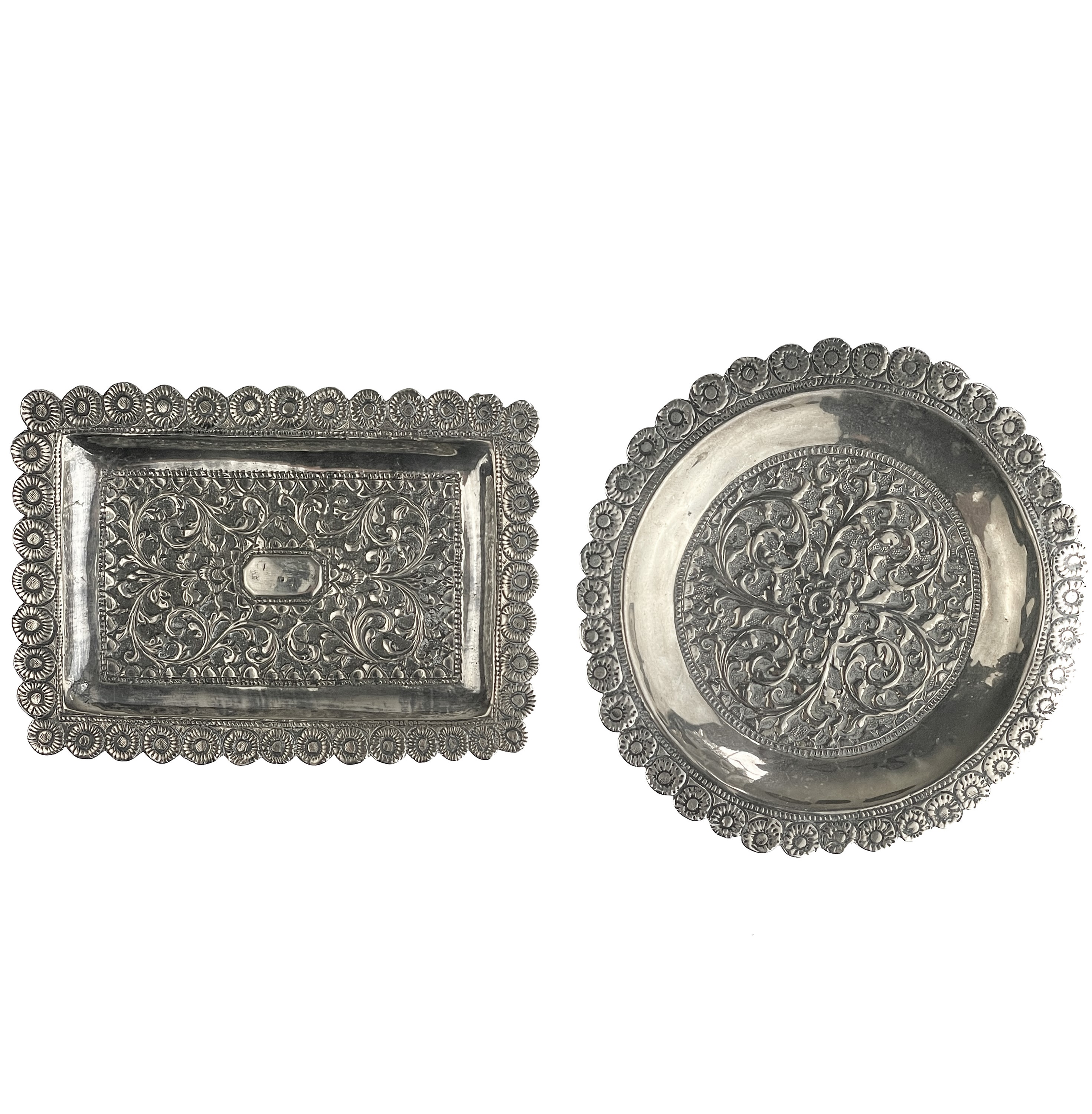 Pin Type Tray Lot 101 - Two Indian silver pin trays.
