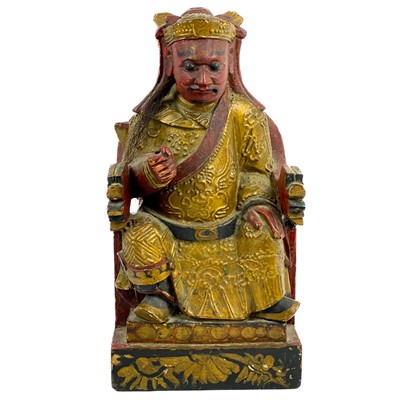 Lot 1222 - A Chinese carved hardwood figure of a seated emperor, circa 1900.