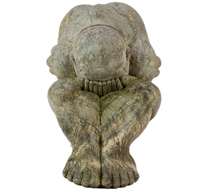 Lot 195 - A 'weeping Buddha' hand carved wooden statue.