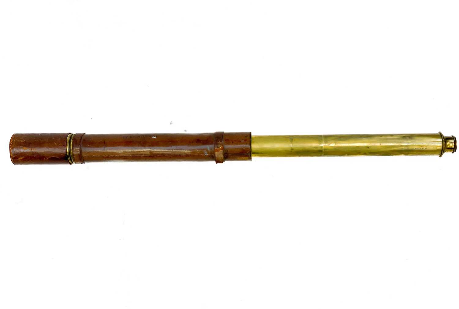 Lot 88 - A Dolland Night or Day single draw brass and leather telescope.