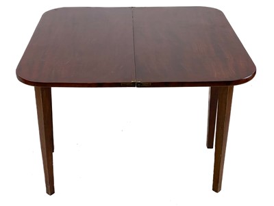 Lot 609 - A 19th century mahogany fold over tea table.