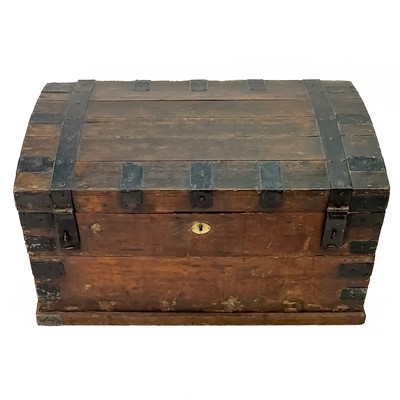 Lot 310 - A Victorian iron bound dome top chest.