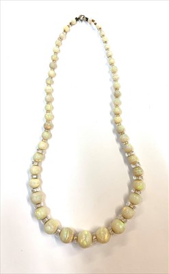 Lot 2496 - An opal necklace with graduated beads...