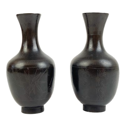 Lot 1076 - A pair of Chinese bronze vases, 19th century.