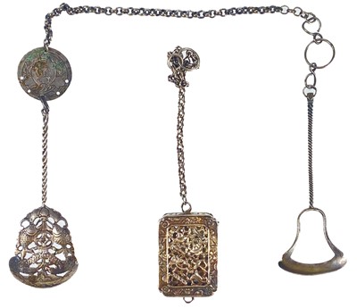 Lot 1084 - Three Chinese silver chatelaine attachments including a vinaigrette or scent box.