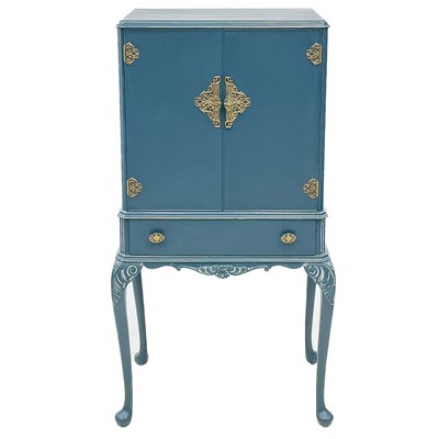 Lot 688 - A blue painted cocktail cabinet.