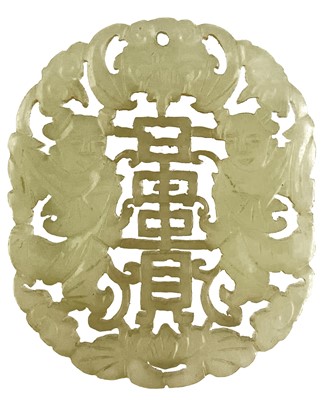 Lot 1295 - A Chinese carved jade pendant.