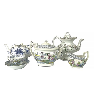 Lot 513 - A collection of nine assorted teapots.