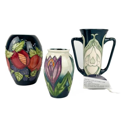 Lot 533 - A Moorcroft Pottery Snowdrop twin handled vase.