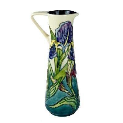 Lot 559 - A Moorcroft Pottery Bishop Iris jug by Rachel Bishop.