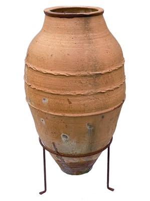 Lot 362 - A terracotta olive jar.