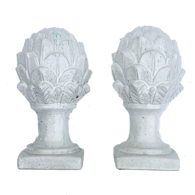 Lot 348 - A pair of white ceramic cones of naturalistic form.