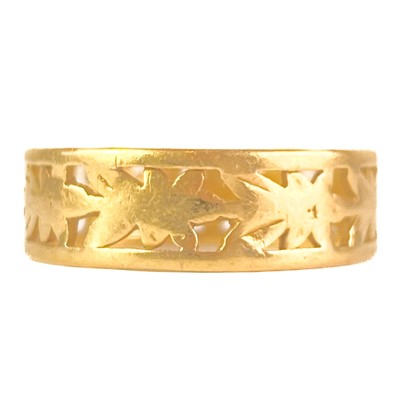 Lot 31 - An 18ct hallmarked gold pierced leaf design band ring.