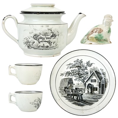 Lot 389 - A Staffordshire pearlware miniature teapot and cover.