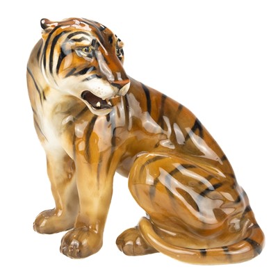 Lot 596 - A Royal Doulton figure of a seated tiger HN 912.