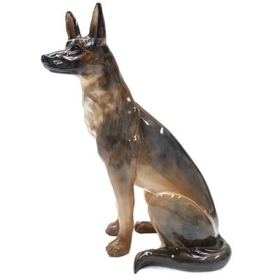 Lot 542 - A Royal Doulton figure of a seated Alsatian or German Shepherd HN921