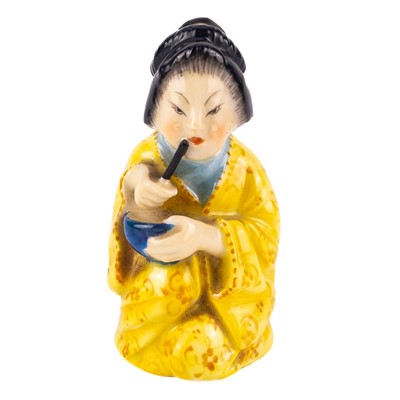 Lot 405 - A Royal Worcester candle snuffer, modelled as a Geisha Girl.