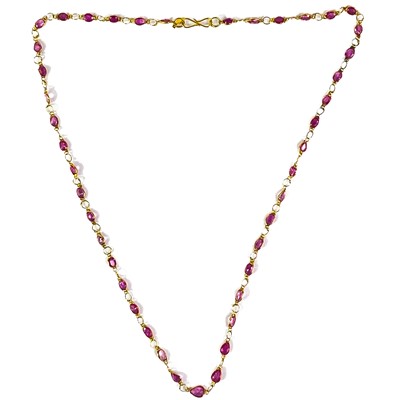 Lot 164 - A 14ct gold ruby spectacle set necklace.