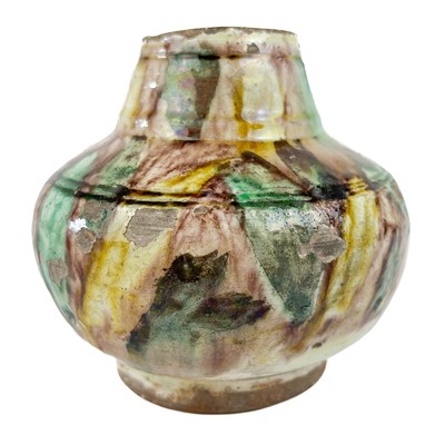 Lot 19 - A Persian lustre glazed squat vase, 18th century.