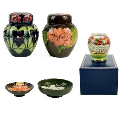 Lot 584 - A Moorcroft Pottery Violets ginger jar and cover.