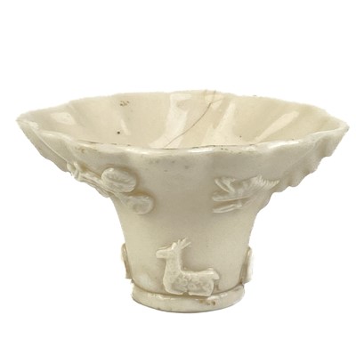 Lot 1335 - A Chinese blanc de chine libation cup, 18th/19th century.