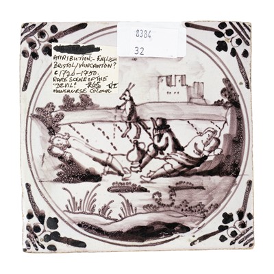 Lot 11 - A Delft manganese tile of the devil.