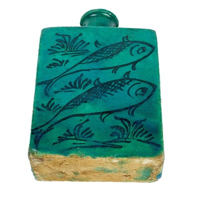 Lot 144 - A Persian turquoise glazed pottery flask, 19th century.