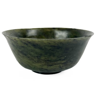 Lot 1436 - A Chinese spinach jade bowl.