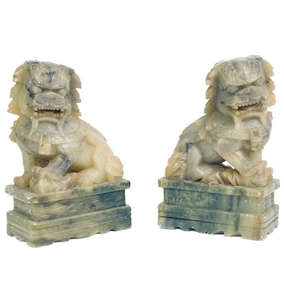 Lot 1413 - A pair of Chinese soapstone dogs of fo, 20th century.