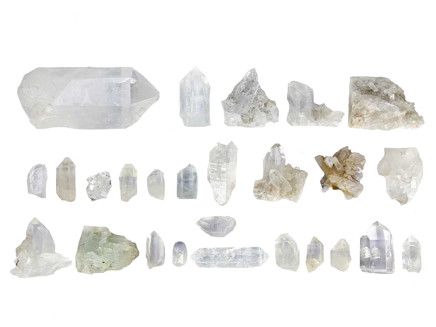 Lot 143 - A collection of hexagonal clear quartz points.