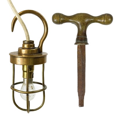 Lot 17 - A brass cage engine inspection lamp by B M A C Ltd.