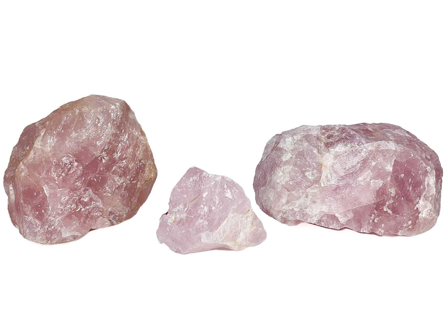 Lot 67 - Three rose quartz specimens.