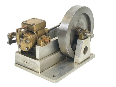 Lot 211 - A miniature engineer apprentice model of a piston and flywheel.
