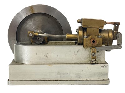 Lot 211 - A miniature engineer apprentice model of a piston and flywheel.