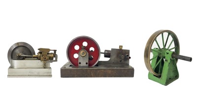 Lot 211 - A miniature engineer apprentice model of a piston and flywheel.