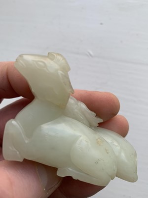 Lot 2 - A Chinese carved celadon jade group of deers, Qing Dynasty, 19th century.