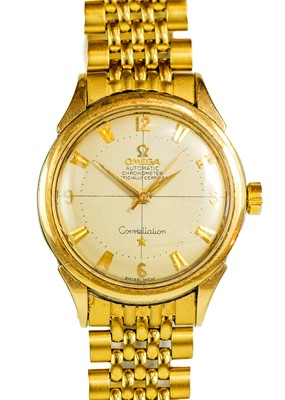 Lot 152 - OMEGA - A Constellation Automatic chronometer gentleman's gold capped bracelet wristwatch.