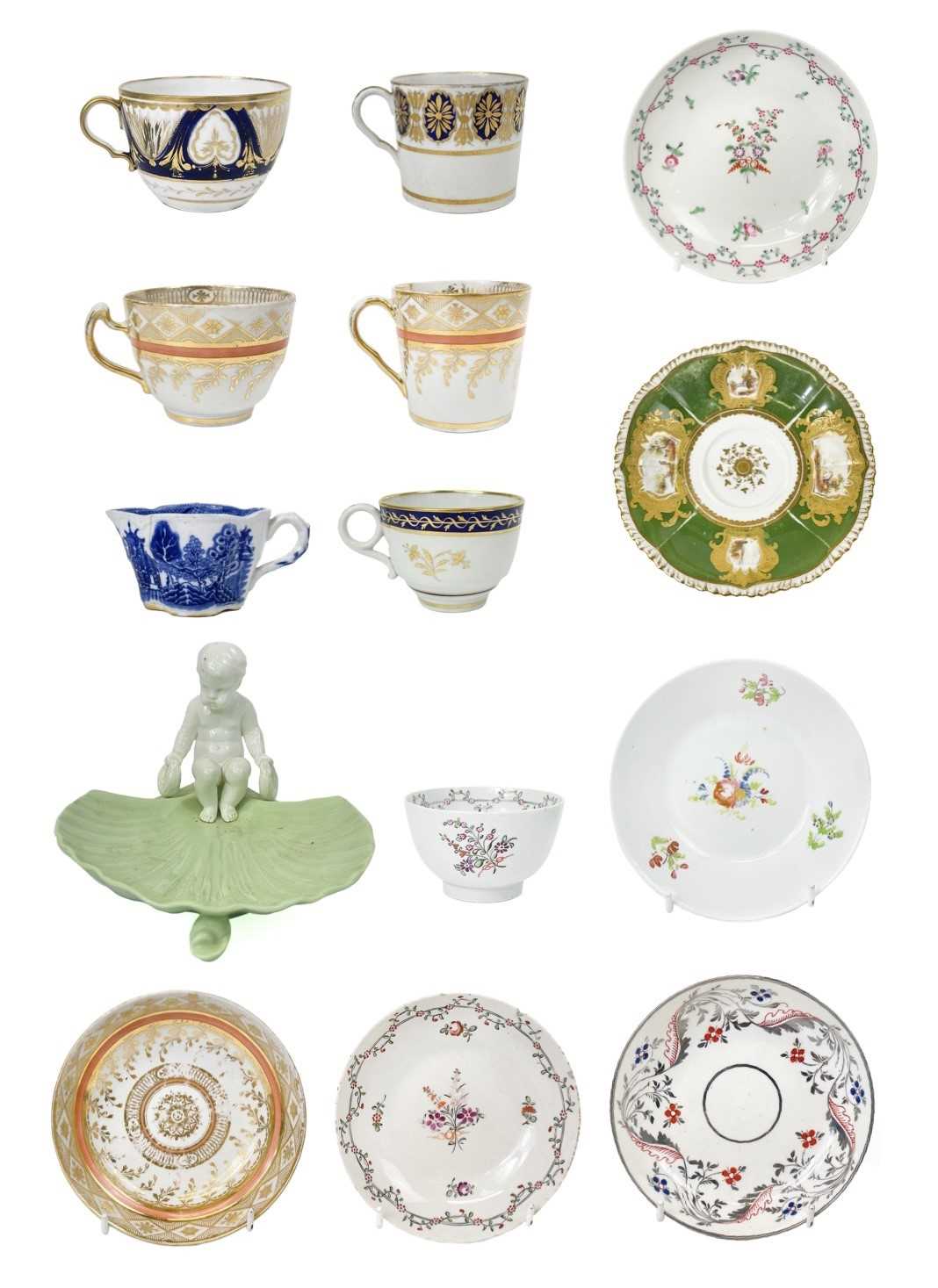 Lot 522 A group of English porcelain teaware.