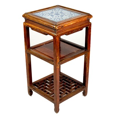 Lot 1367 - A Chinese wood jardiniere stand, 20th century.