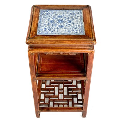 Lot 1367 - A Chinese wood jardiniere stand, 20th century.