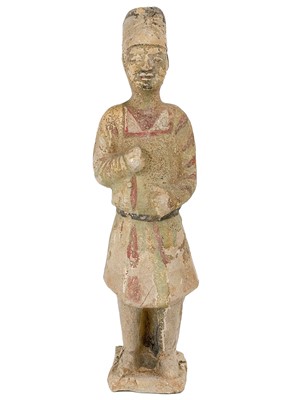 Lot 1380 - A Chinese pottery tomb figure of a male court attendant, Han Dynasty