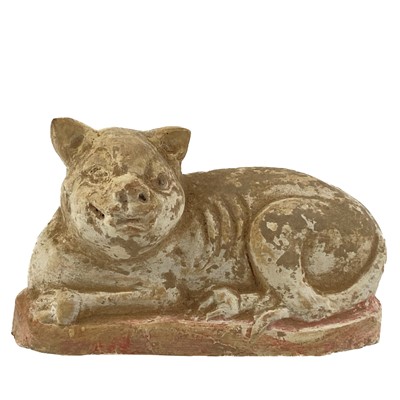 Lot 1384 - A Chinese pottery stylised model of a dog, Han Dynasty.