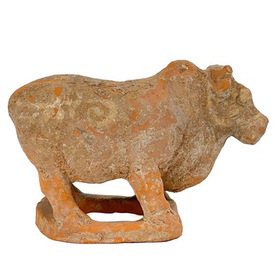 Lot 1386 - A Chinese pottery model of a bull, Han Dynasty