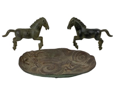 Lot 1392 - A pair of Chinese bronze models of horses, late 19th century.