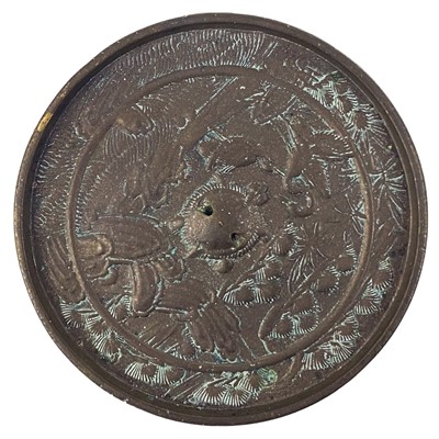 Lot 1403 - A Japanese bronze hand mirror, 19th century.