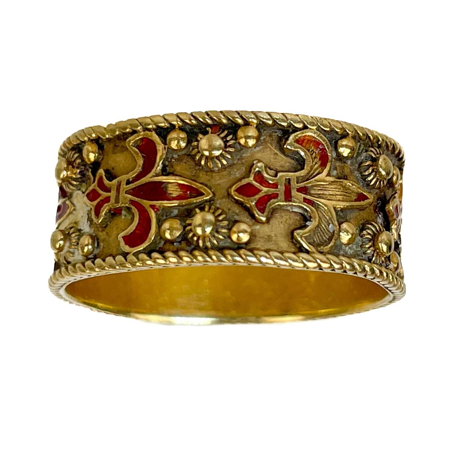 Lot 23 - A 14ct gold and red champleve enamel band ring.